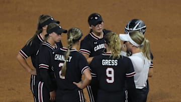 May 8, 2025; Athens, GA, USA;  South Carolina teammates meet on the mound during a game against Texas A&M at Jack Turner Stadium. Mandatory Credit: Mady Mertens-Imagn Images