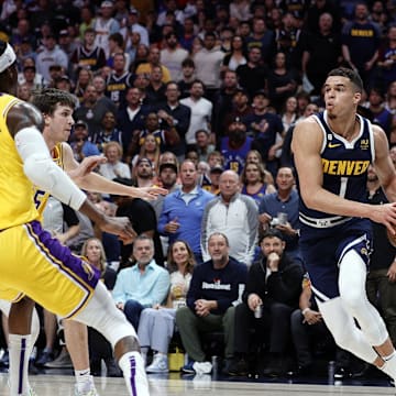 Denver Nuggets forward Michael Porter Jr. (1) against Los Angeles Lakers forward Jarred Vanderbilt (2) during game two of the 2023 NBA Western Conference Finals at Ball Arena. 