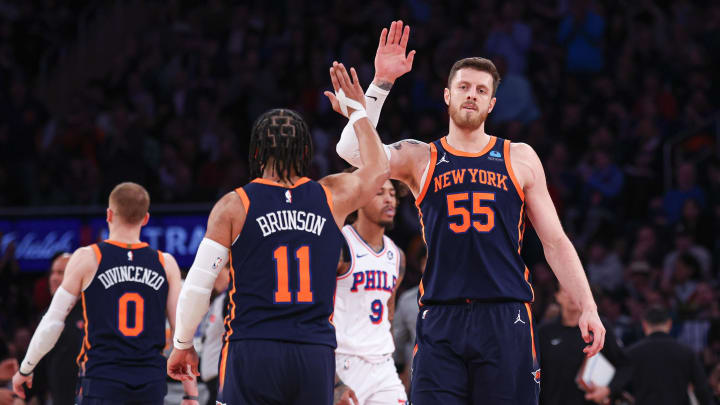 Mar 12, 2024; New York, New York, USA; New York Knicks center Isaiah Hartenstein (55) slaps hands with guard Jalen Brunson (11) during the second quarter against the Philadelphia 76ers at Madison Square Garden. Mandatory Credit: Vincent Carchietta-USA TODAY Sports