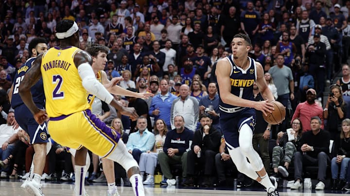 Denver Nuggets forward Michael Porter Jr. (1) against Los Angeles Lakers forward Jarred Vanderbilt (2) during game two of the 2023 NBA Western Conference Finals at Ball Arena. 