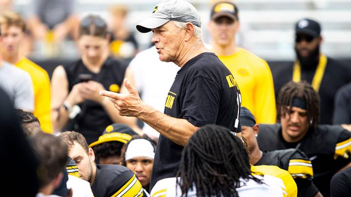 Aug 9, 2025; Iowa head coach Kirk Ferentz talks with players during the Hawkeyes Kids Day NCAA football open practice at Kinnick Stadium in Iowa City, Iowa. Mandatory Credit: Joseph Cress for the Des Moines Register