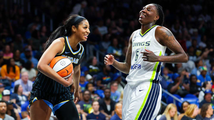 Chicago Sky forward Angel Reese laughs with Dallas Wings forward Natasha Howard