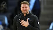 Dec 15, 2024; San Francisco, California, USA; Dallas Mavericks guard Luka Doncic (77) warms up before the game against the Golden State Warriors at Chase Center. Mandatory Credit: Darren Yamashita-Imagn Images