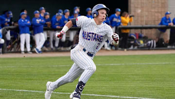 Ft. Cobb-Broxton's Eli Willits runs to first after hitting a fly ball during the high school baseball game between Fort Cobb-Broxton and Stillwater at Edmond Santa Fe High School in Edmond, Okla., Friday, April, 18, 2025.