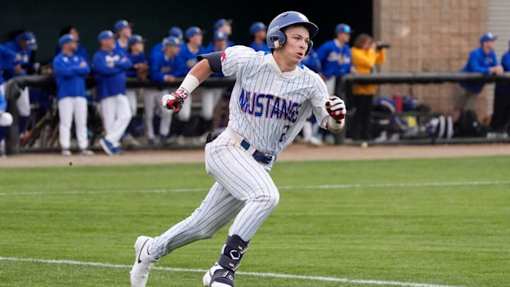 Fort Cobb-Broxton's Eli Willits runs to first after hitting a fly ball during the high school baseball game between Fort Cobb-Broxton and Stillwater at Edmond Santa Fe High School in Edmond, Okla., Friday, April, 18, 2025.