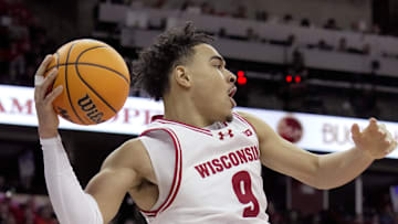 Wisconsin guard John Tonje passes the ball during the second half of their game Tuesday, February 18, 2025 at the Kohl Center in Madison, Wisconsin. Wisconsin beat Illinois 95-74.