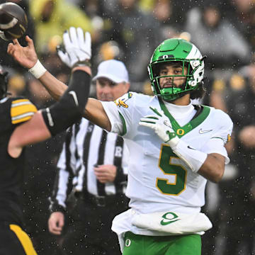 Dante Moore led the Oregon Ducks on a game-winning drive against Iowa.
