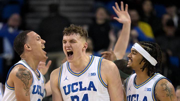UCLA Bruins guard Kobe Johnson and guard Skyy Clark celebrate with forward Tyler Bilodeau. Mandatory Credit: Jayne Kamin-Oncea-Imagn Images
