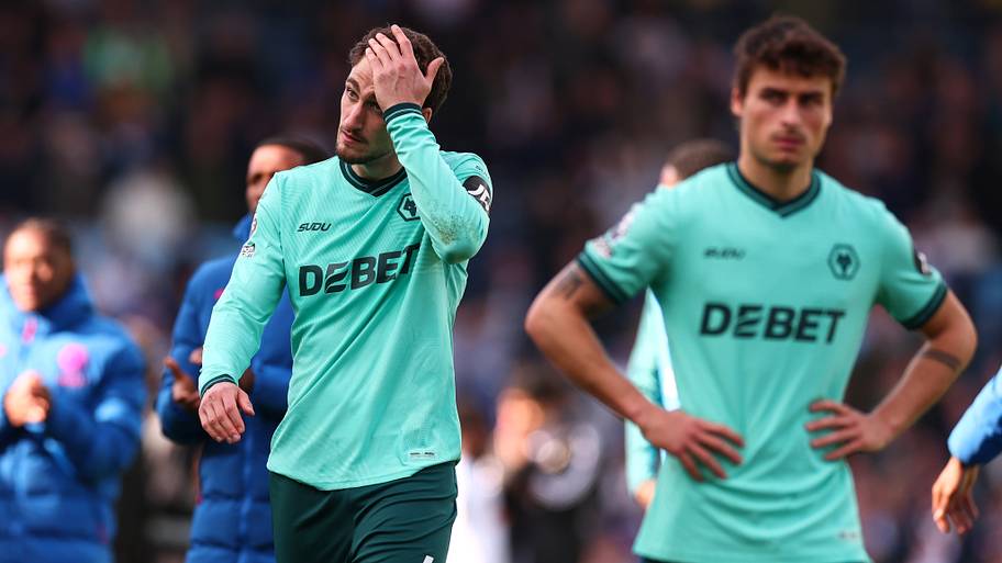 Wolves players looking upset.