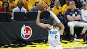 Apr 19, 2025; Indianapolis, Indiana, USA; Indiana Pacers guard Tyrese Haliburton (0) shoots the ball in the second half against the Milwaukee Bucks at Gainbridge Fieldhouse. Mandatory Credit: Trevor Ruszkowski-Imagn Images