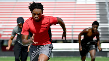 Laron Dues runs sprints with teammates Monday Monday morning. Cardinal Mooney High football players participate in the school's summer strength and conditioning camp Monday, July 22, 2024. The Cougars won the FHSAA Class 1S state championship last year, defeating Trinity Catholic.