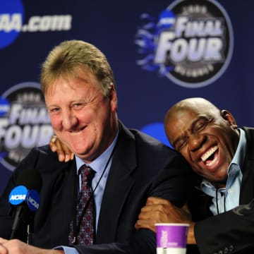 Apr 6, 2009; Detroit, MI, USA; Michigan State Spartans and NBA former player Magic Johnson (right) hugs NBA former player Larry Bird (left) during a press conference before the championship game of the Final Four in the 2009 NCAA mens basketball tournament against the North Carolina Tar Heels at Ford Field. Mandatory Credit: Bob Donnan-USA TODAY Sports