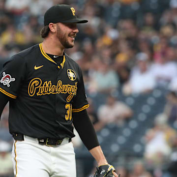 Aug 7, 2025; Pittsburgh, Pennsylvania, USA;  Pittsburgh Pirates starting pitcher Paul Skenes (30) reacts after striking out Cincinnati Reds shortstop Elly De La Cruz (not pictured) to end the third inning at PNC Park. Mandatory Credit: Charles LeClaire-Imagn Images