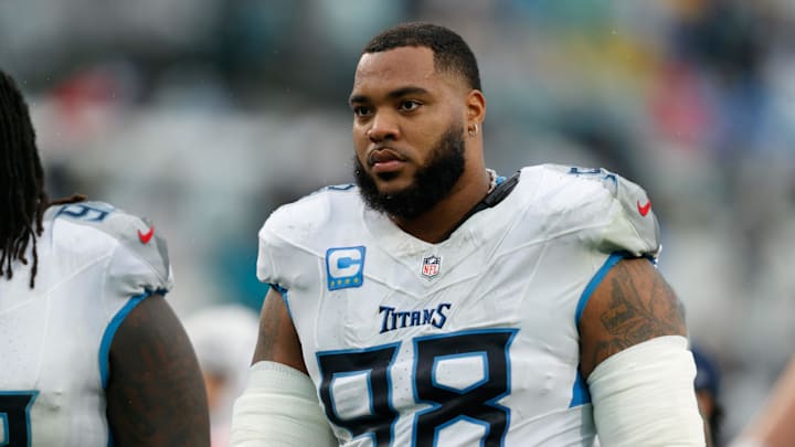Dec 29, 2024; Jacksonville, Florida, USA; Tennessee Titans defensive tackle Jeffery Simmons (98) heads to the locker room for half time against the Jacksonville Jaguars at EverBank Stadium. Mandatory Credit: Morgan Tencza-Imagn Images Dec 29, 2024; Jacksonville, Florida, USA; Tennessee Titans defensive tackle Jeffery Simmons (98) heads to the locker room for half time against the Jacksonville Jaguars at EverBank Stadium. Mandatory Credit: Morgan Tencza-Imagn Images