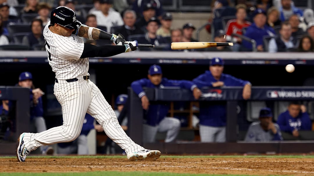 Oct 30, 2024; New York, New York, USA; New York Yankees second baseman Gleyber Torres (25) breaks his bat on a ground out during the seventh inning against the Los Angeles Dodgers in game five of the 2024 MLB World Series at Yankee Stadium. Mandatory Credit: Vincent Carchietta-Imagn Images