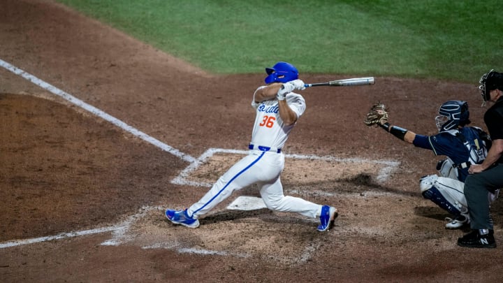 Florida's outfielder Wyatt Langford (36) with a double in the bottom of the sixth against Charleston