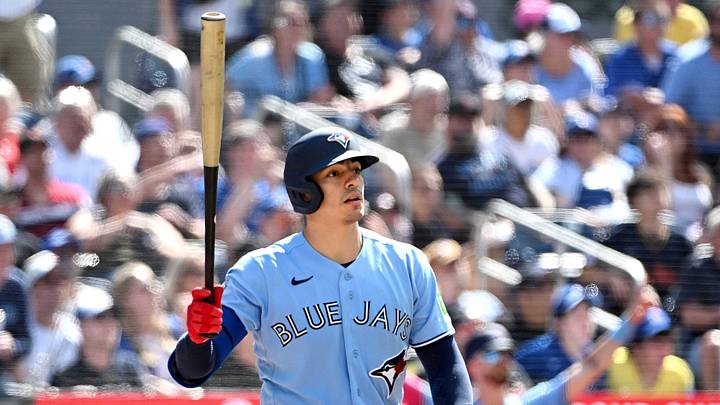 Jun 7, 2026; Toronto, Ontario, CAN; Toronto Blue Jays catcher Brandon Valenzuela (59) hits a solo home run against the Baltimore Orioles in the eighth inning at Rogers Centre. Mandatory Credit: Dan Hamilton-Imagn Images