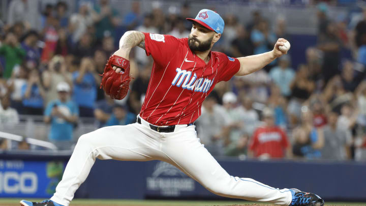 Jul 6, 2024; Miami, Florida, USA; Miami Marlins relief pitcher Tanner Scott (66) pitches against the Chicago White Sox during the ninth inning at loanDepot Park.