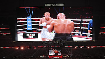 Nov 15, 2024; Arlington, Texas, UNITED STATES;  Mike Tyson (black gloves) fights Jake Paul (silver gloves) at AT&T Stadium. 