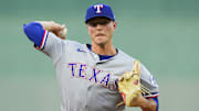 Aug 18, 2025; Kansas City, Missouri, USA; Texas Rangers starting pitcher Jack Leiter (35) pitches during the first inning against the Kansas City Royals at Kauffman Stadium. 