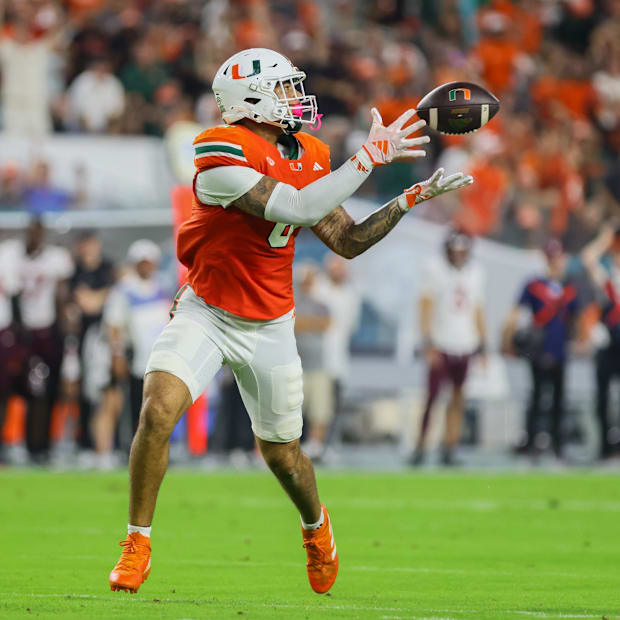 Miami Hurricanes tight end Elijah Arroyo catches the football for a touchdown against the Virginia Tech Hokies. Miami Hurricanes tight end Elijah Arroyo catches the football for a touchdown against the Virginia Tech Hokies.