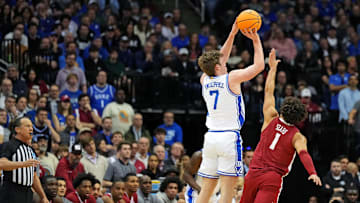 Mar 29, 2025; Newark, NJ, USA; Duke Blue Devils guard Kon Knueppel (7) shoots the ball against Alabama Crimson Tide guard Mark Sears (1) during the first half.