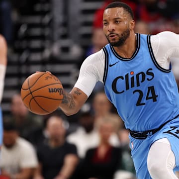 Feb 8, 2025; Inglewood, California, USA;  Los Angeles Clippers guard Norman Powell (24) brings the ball up court during the third quarter against the Utah Jazz at Intuit Dome. Mandatory Credit: Kiyoshi Mio-Imagn Images