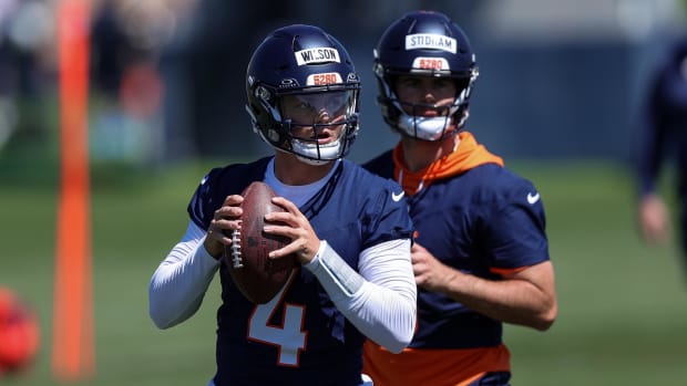 Denver Broncos quarterback Zach Wilson (4) and quarterback Jarrett Stidham (8) during organized team activities.