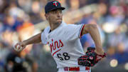 Jul 9, 2025; Minneapolis, Minnesota, USA; Minnesota Twins starting pitcher David Festa (58) delivers a pitch against the Chicago Cubs in the first inning at Target Field.