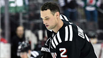 Apr 11, 2025; Newark, New Jersey, USA; New Jersey Devils defenseman Brian Dumoulin (2) warms up prior to a game against  the Pittsburgh Penguins at Prudential Center. Mandatory Credit: John Jones-Imagn Images
