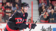 Jan 25, 2023; Ottawa, Ontario, CAN; Ottawa Senators center Shane Pinto (57) skates to the bench after scoring in thew first period against the New York Islanders  at the Canadian Tire Centre. Mandatory Credit: Marc DesRosiers-USA TODAY Sports