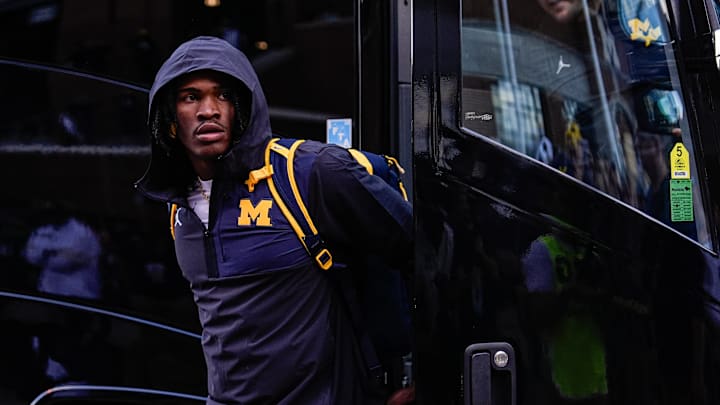 Michigan quarterback Bryce Underwood (19) walked the wrong way coming out of the bus as the Wolverines arrived at The Big House.