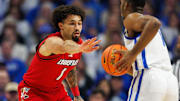 Dec 14, 2024; Lexington, Kentucky, USA; Louisville Cardinals guard J'Vonne Hadley (1) guards Kentucky Wildcats guard Lamont Butler (1) during the first half at Rupp Arena at Central Bank Center. Mandatory Credit: Jordan Prather-Imagn Images