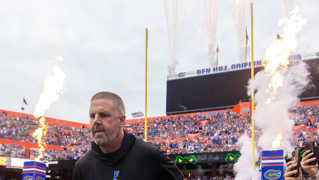 Florida Gators head coach Billy Napier runs onto the field before the start of the game at Ben Hill Griffin Stadium in Gainesville, FL on Saturday, September 7, 2024 against the Samford Bulldogs. The Gators won 45-7. [Doug Engle/Gainesville Sun]