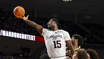 Feb 26, 2025; College Station, Texas, USA; Texas A&M Aggies forward Henry Coleman III (15) attempts to secure the rebound during the second half against the Vanderbilt Commodores at Reed Arena. Mandatory Credit: Maria Lysaker-Imagn Images 