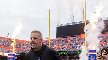 Florida Gators head coach Billy Napier runs onto the field before the start of the game at Ben Hill Griffin Stadium in Gainesville, FL on Saturday, September 7, 2024 against the Samford Bulldogs. The Gators won 45-7. [Doug Engle/Gainesville Sun]