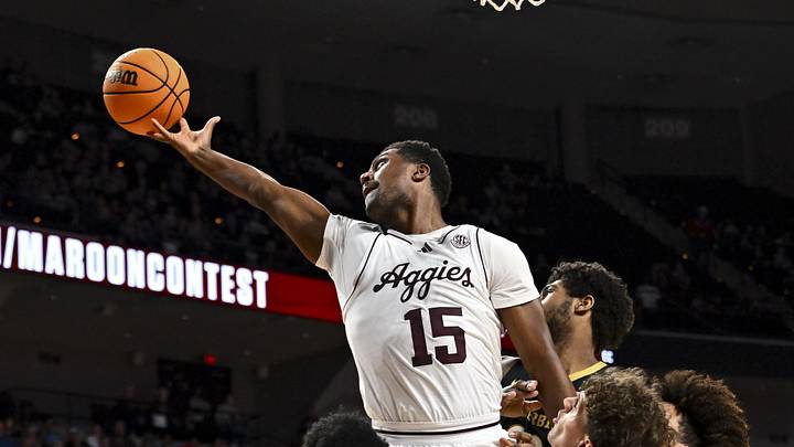 Feb 26, 2025; College Station, Texas, USA; Texas A&M Aggies forward Henry Coleman III (15) attempts to secure the rebound during the second half against the Vanderbilt Commodores at Reed Arena. Mandatory Credit: Maria Lysaker-Imagn Images 