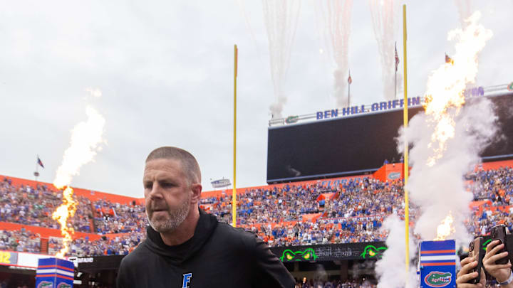 Florida Gators head coach Billy Napier runs onto the field before the start of the game at Ben Hill Griffin Stadium in Gainesville, FL on Saturday, September 7, 2024 against the Samford Bulldogs. The Gators won 45-7. [Doug Engle/Gainesville Sun]