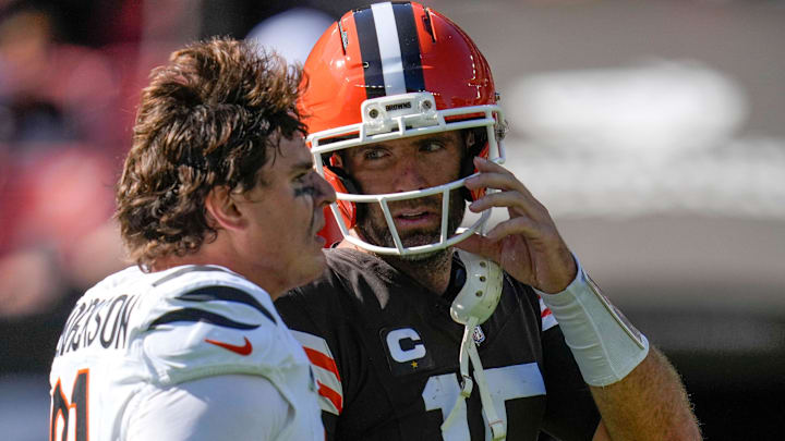 Cincinnati Bengals defensive end Trey Hendrickson (91) and Cleveland Browns quarterback Joe Flacco (15) talk after the fourth quarter of the NFL Week 1 game between the Cleveland Browns and the Cincinnati Bengals at Huntington Bank Field in Cleveland on Sunday, Sept. 7, 2025. The Bengals begin the season with a 17-16 win over the Browns.