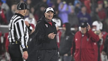 Dec 28, 2024; Annapolis, MD, USA;  North Carolina State Wolfpack head coach Dave Doeren reacts after a play during the first half of the Go Bowling Military Bowl at Navy-Marine Corps Memorial Stadium. Mandatory Credit: Tommy Gilligan-Imagn Images