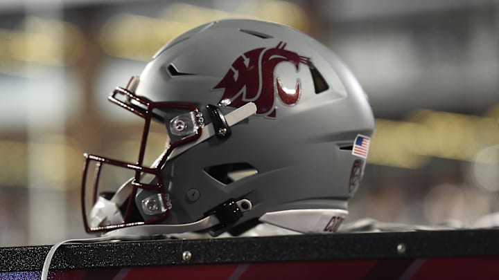 Sep 4, 2021; Pullman, Washington, USA; Washington State Cougars helmet sits during a game against the Utah State Aggies in the first half at Gesa Field at Martin Stadium. Mandatory Credit: James Snook-Imagn Images Sep 4, 2021; Pullman, Washington, USA; Washington State Cougars helmet sits during a game against the Utah State Aggies in the first half at Gesa Field at Martin Stadium. Mandatory Credit: James Snook-Imagn Images