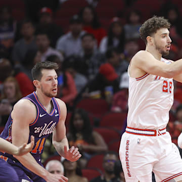 Feb 23, 2024; Houston, Texas, USA; Houston Rockets center Alperen Sengun (28) grabs a rebound during the first quarter against the Phoenix Suns at Toyota Center. Mandatory Credit: Troy Taormina-USA TODAY Sports