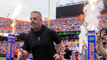 Florida Gators head coach Billy Napier runs onto the field before the start of the game at Ben Hill Griffin Stadium in Gainesville, FL on Saturday, September 7, 2024 against the Samford Bulldogs. The Gators won 45-7. [Doug Engle/Gainesville Sun]