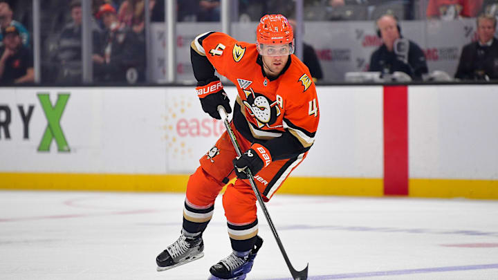 Oct 22, 2024; Anaheim, California, USA; Anaheim Ducks defenseman Cam Fowler (4) controls the puck against the San Jose Sharks  during the second period at Honda Center. Mandatory Credit: Gary A. Vasquez-Imagn Images