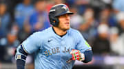 Oct 15, 2025; Seattle, Washington, USA; Toronto Blue Jays center fielder Daulton Varsho (5) runs after hitting a two RBI double during the third inning against the Seattle Mariners during game three of the ALCS round for the 2025 MLB playoffs at T-Mobile Park. Mandatory Credit: Steven Bisig-Imagn Images