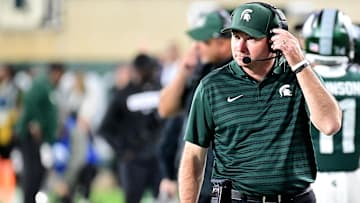 Sep 28, 2024; East Lansing, Michigan, USA; Michigan State Spartans head coach Jonathan Smith watches from the sidelines during the fourth quarter as the Ohio State Buckeyes defeat his team at Spartan Stadium. Mandatory Credit: Dale Young-Imagn Images