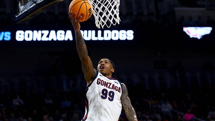 Mar 20, 2025; Wichita, KS, USA; Gonzaga Bulldogs guard Khalif Battle (99) shoots in the first half of a first round men’s NCAA Tournament game against the Georgia Bulldogs at Intrust Bank Arena. Mandatory Credit: Nick Tre. Smith-Imagn Images