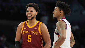 Nov 24, 2025; Las Vegas, Nevada, USA; Iowa State Cyclones forward Joshua Jefferson (5) celebrates as St. John's Red Storm forward Dillon Mitchell (1) watches in the second half in a 2025 Players Era Festival group play game at Michelob Ultra Arena. 