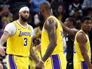 Los Angeles Lakers forward Anthony Davis (3) reacts with forward LeBron James (23) during the second half against the Memphis Grizzlies at FedExForum. 