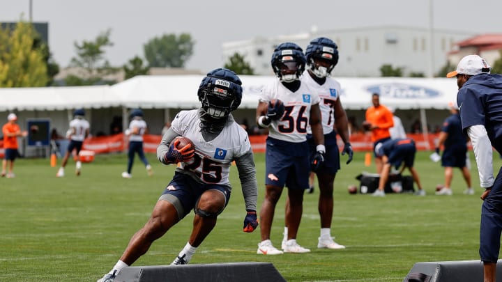 Jul 26, 2024; Englewood, CO, USA; Denver Broncos running back Samaje Perine (25) during training camp at Broncos Park Powered by CommonSpirit. Mandatory Credit: Isaiah J. Downing-USA TODAY Sports